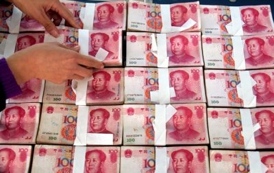 Центробанк Китая снизил курс юаня до минимума августа 2011 года