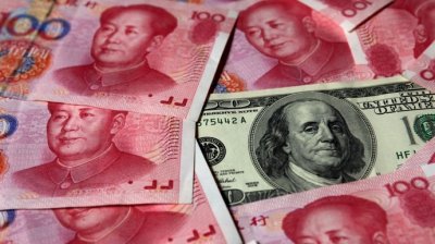 Китай начал реализацию плана по девальвации юаня